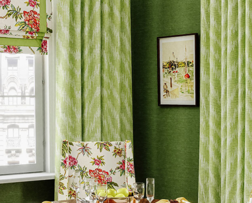 Green drapes with floral accents